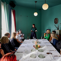 Styled chocolate tasting table with craft chocolate samples, candles and textured elements for Fiamma’s Chocolate Tasting Experience in Brunswick.
