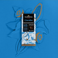 valrhona caraibe dark chocolate bar 70g – french artisan chocolate – caribbean cocoa origins - wrapper on blue cacao art