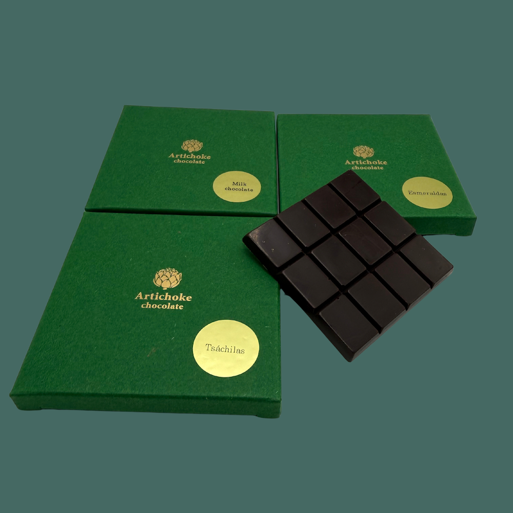 Artichoke Chocolate range. Three Japanese bean-to-bar chocolates including Tsáchila and Esmeraldas, one bar unwrapped from Fiamma Chocolate, delivered Australia wide