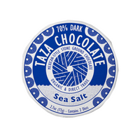 A single round package of Taza Chocolate Sea Salt 70% Dark chocolate discs, shown on a plain white background.